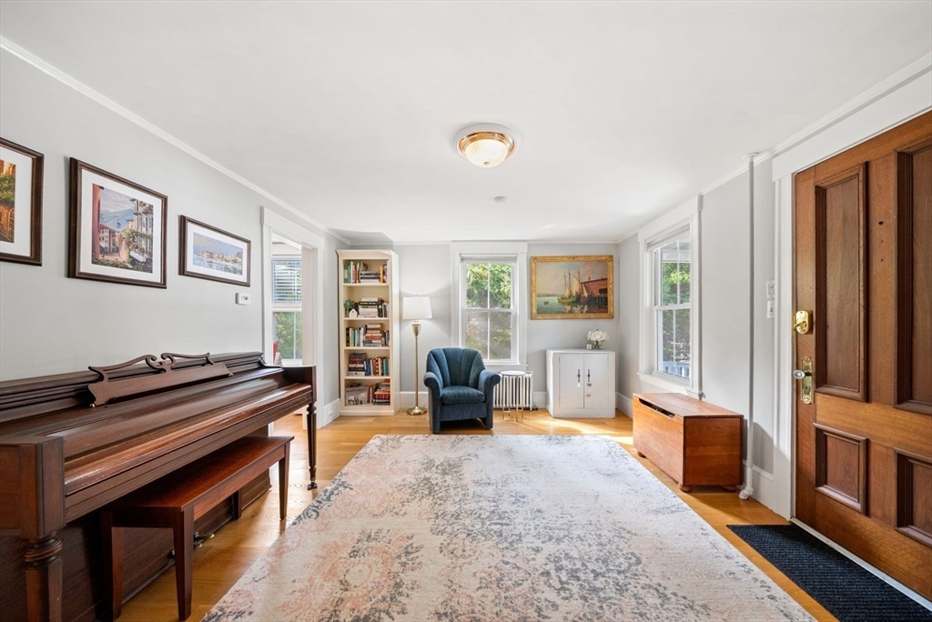 48 Golden Ball Road Weston, MA 02493 - Photo 5 of 21 a living room with furniture and a fireplace