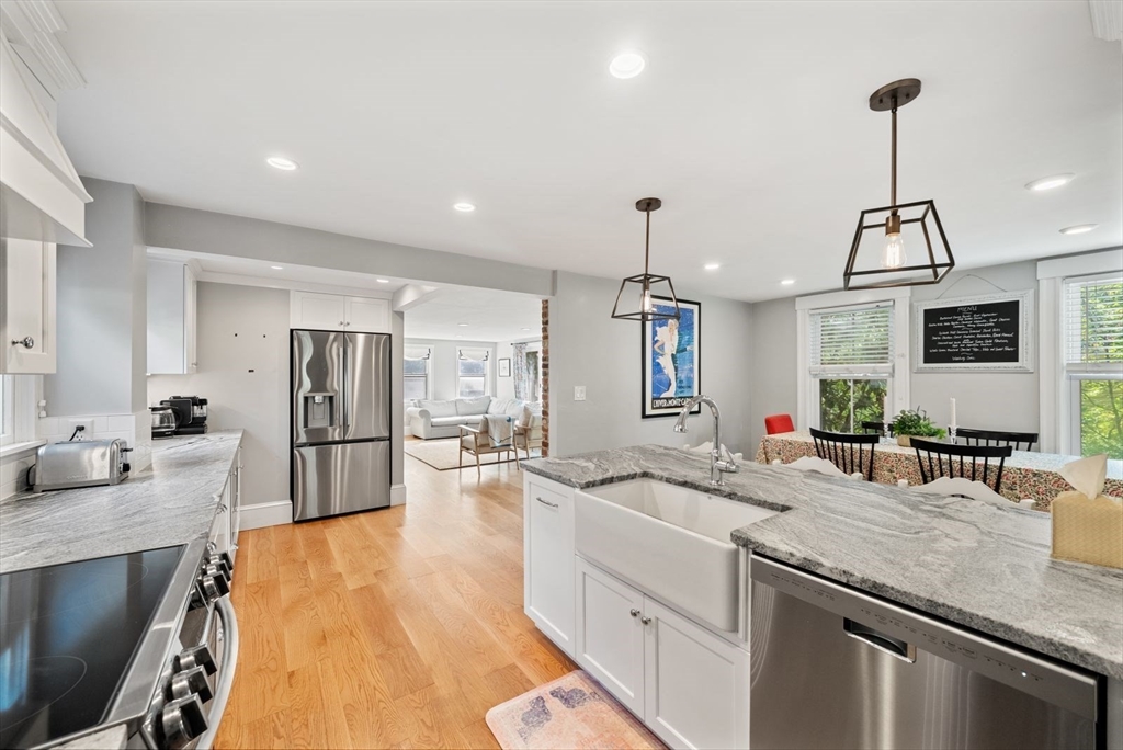 48 Golden Ball Road Weston, MA 02493 - Photo 6 of 21 a kitchen with sink refrigerator and microwave
