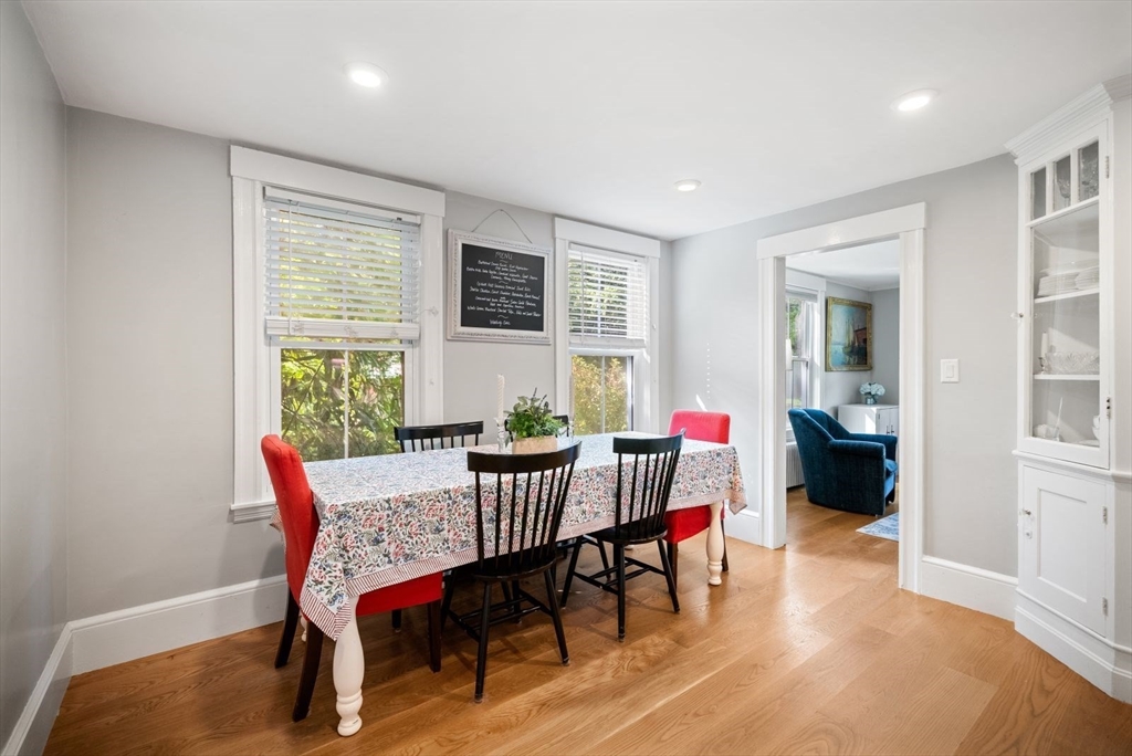 48 Golden Ball Road Weston, MA 02493 - Photo 10 of 21 a view of a dining room with furniture and wooden floor