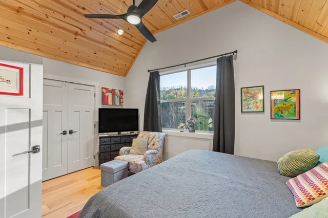 a living room with furniture toys and a window