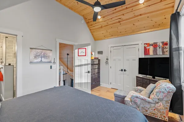 a room with furniture and a flat screen tv