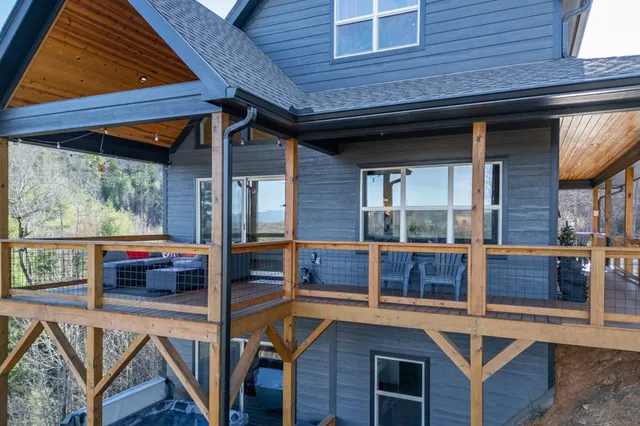 a view of an empty room with windows