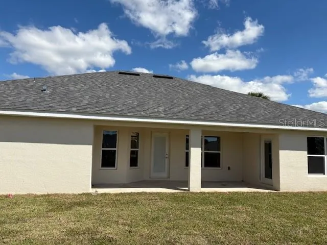 a front view of house with yard
