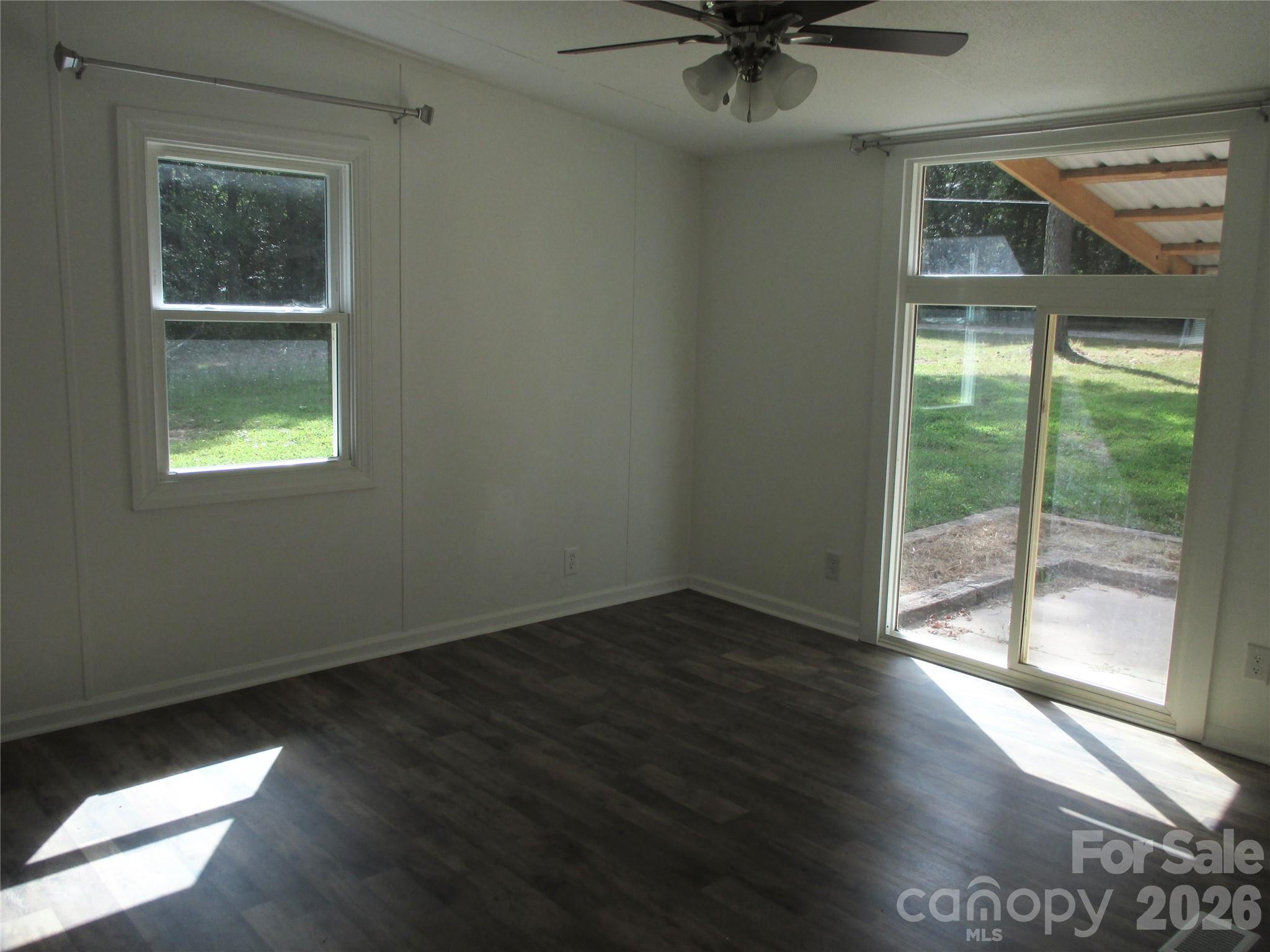 5714 Tipton Road Monroe, NC 28112 - Photo 11 of 26 a view of an empty room with a window