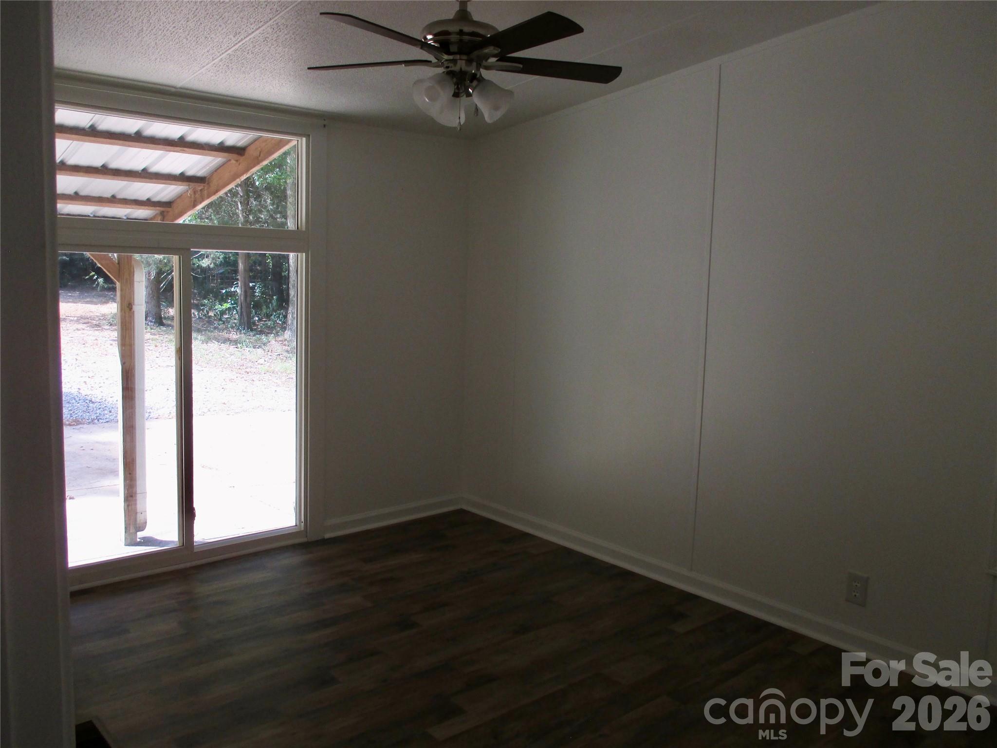 5714 Tipton Road Monroe, NC 28112 - Photo 15 of 26 a view of an empty room with a window