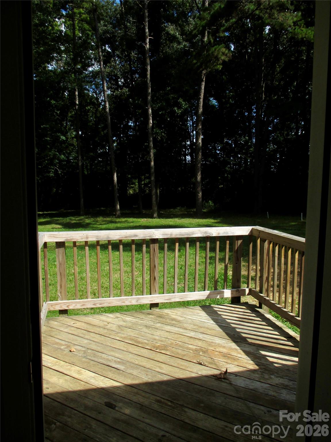 5714 Tipton Road Monroe, NC 28112 - Photo 19 of 26 a view of a wooden deck