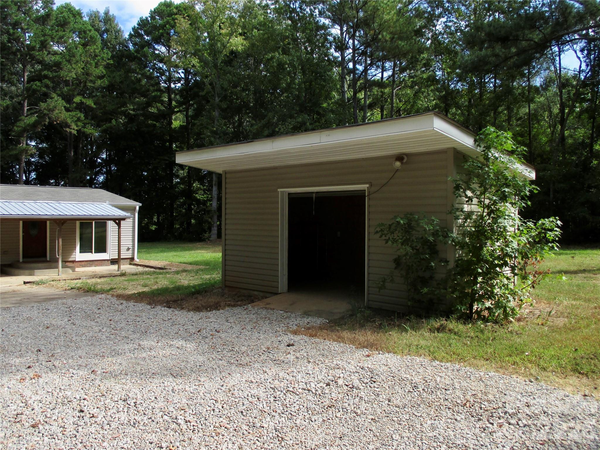 5714 Tipton Road Monroe, NC 28112 - Photo 5 of 26 a view of a house with a yard