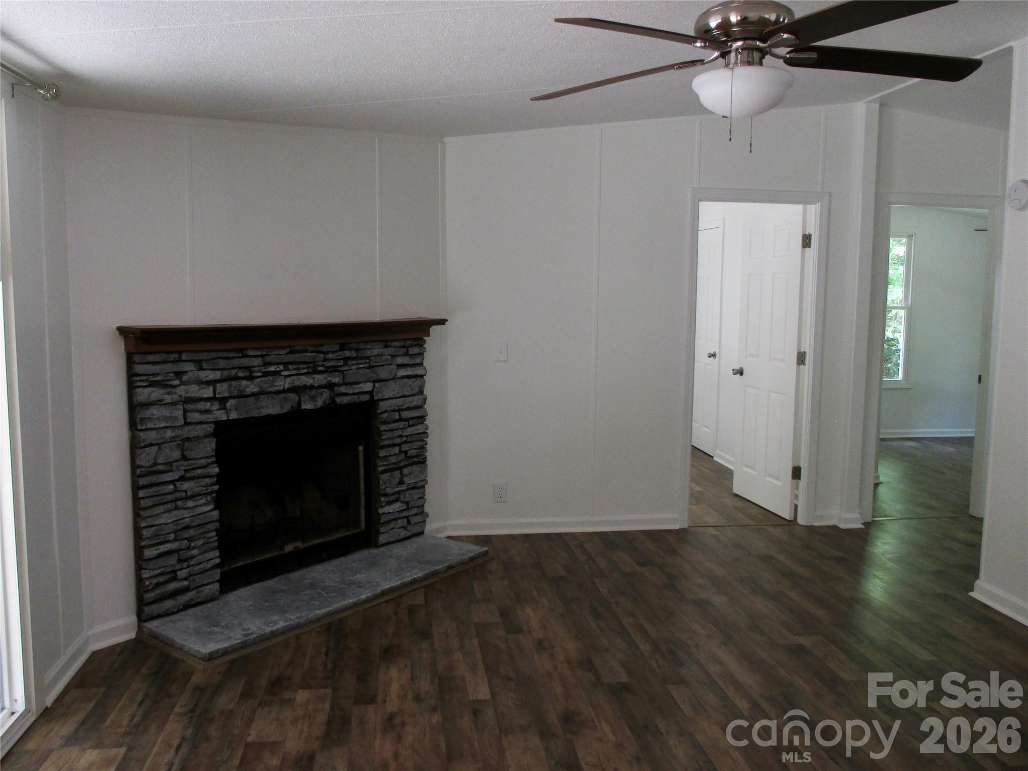 5714 Tipton Road Monroe, NC 28112 - Photo 7 of 26 a living room with a fireplace