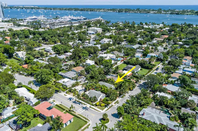 an aerial view of multiple house with yard