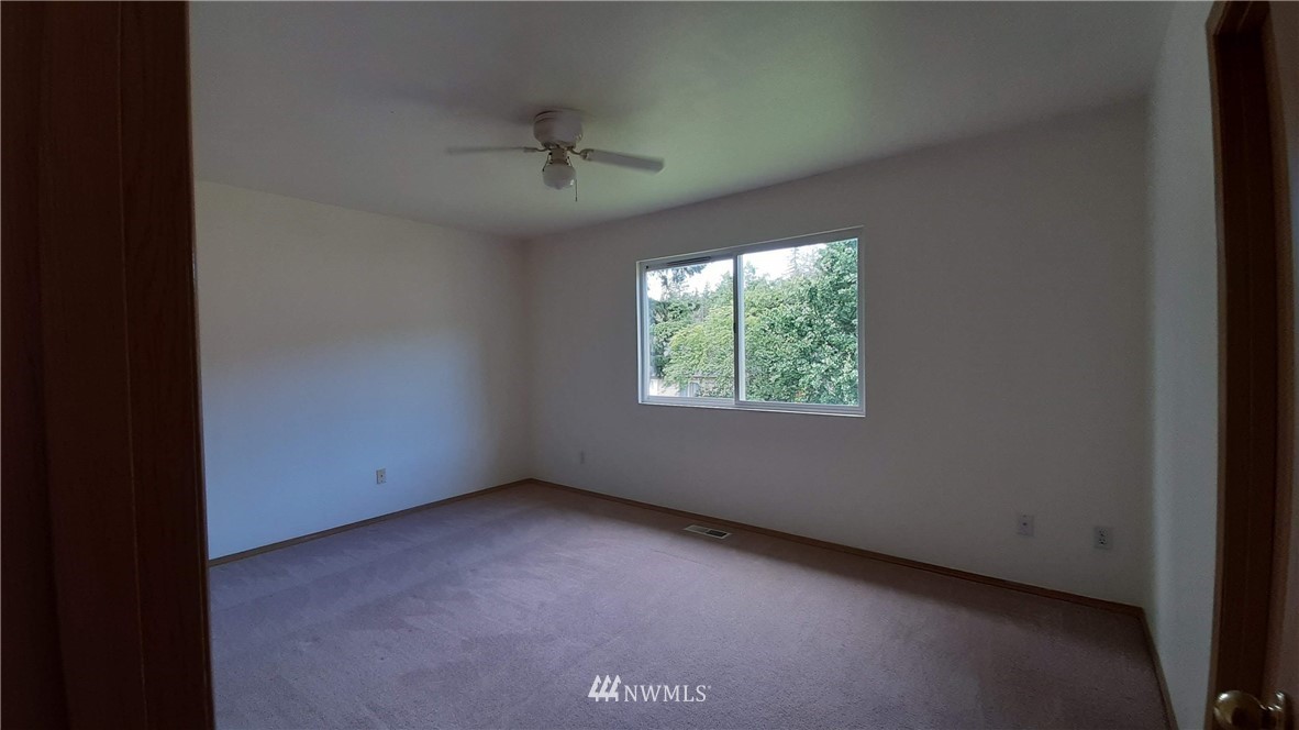 333 East Springfield Loop Shelton, WA 98584 - Photo 14 of 27 an empty room with a window