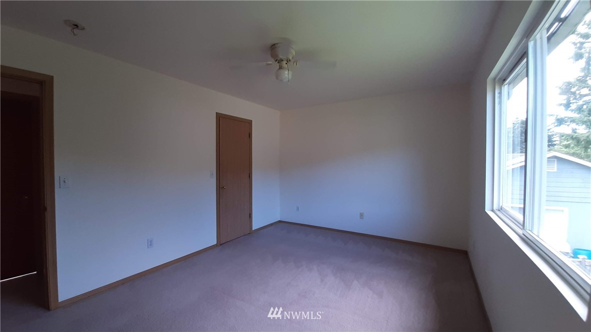 333 East Springfield Loop Shelton, WA 98584 - Photo 15 of 27 an empty room with a window