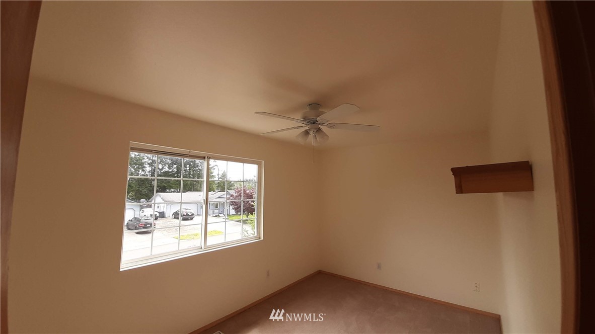 333 East Springfield Loop Shelton, WA 98584 - Photo 16 of 27 an empty room with a window