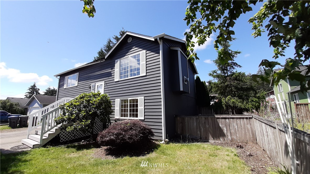 333 East Springfield Loop Shelton, WA 98584 - Photo 3 of 27 a view of house with wooden fence