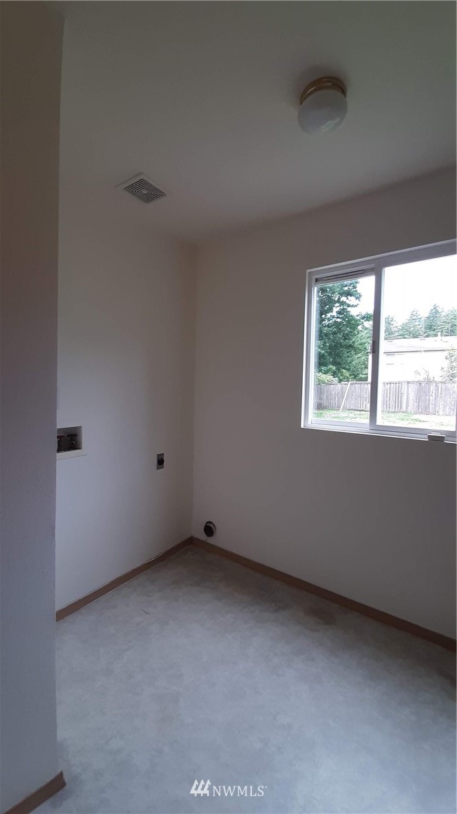 333 East Springfield Loop Shelton, WA 98584 - Photo 22 of 27 a view of an empty room with a window