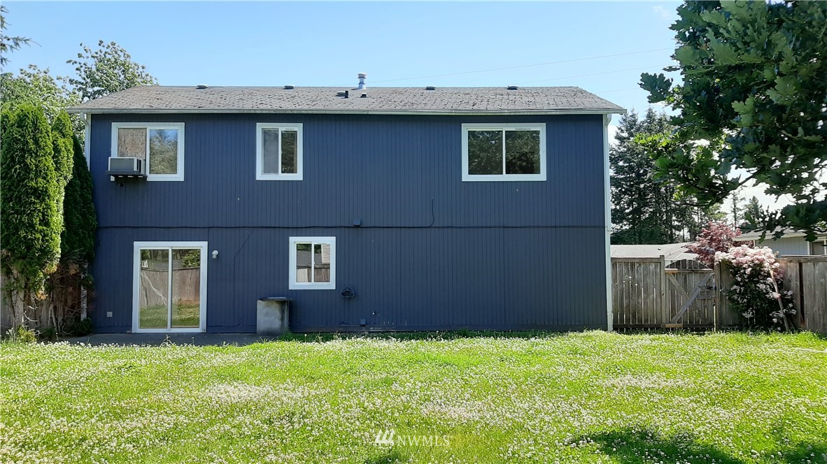 333 East Springfield Loop Shelton, WA 98584 - Photo 4 of 27 a brick house with a yard in front of it