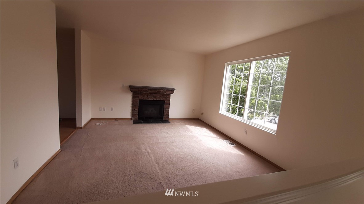 333 East Springfield Loop Shelton, WA 98584 - Photo 5 of 27 an empty room with windows
