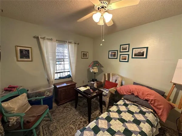 a bathroom with a sink mirror vanity and toilet
