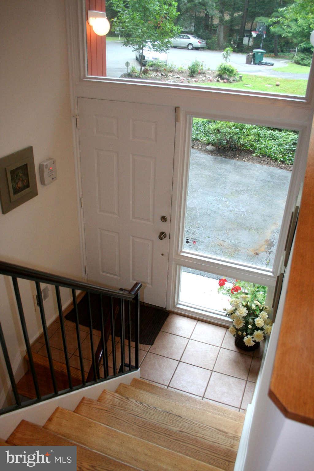 12232 Quorn Lane Reston, VA 20191 - Photo 11 of 20 Hardwood Stairs to Upper and Lower Lvl