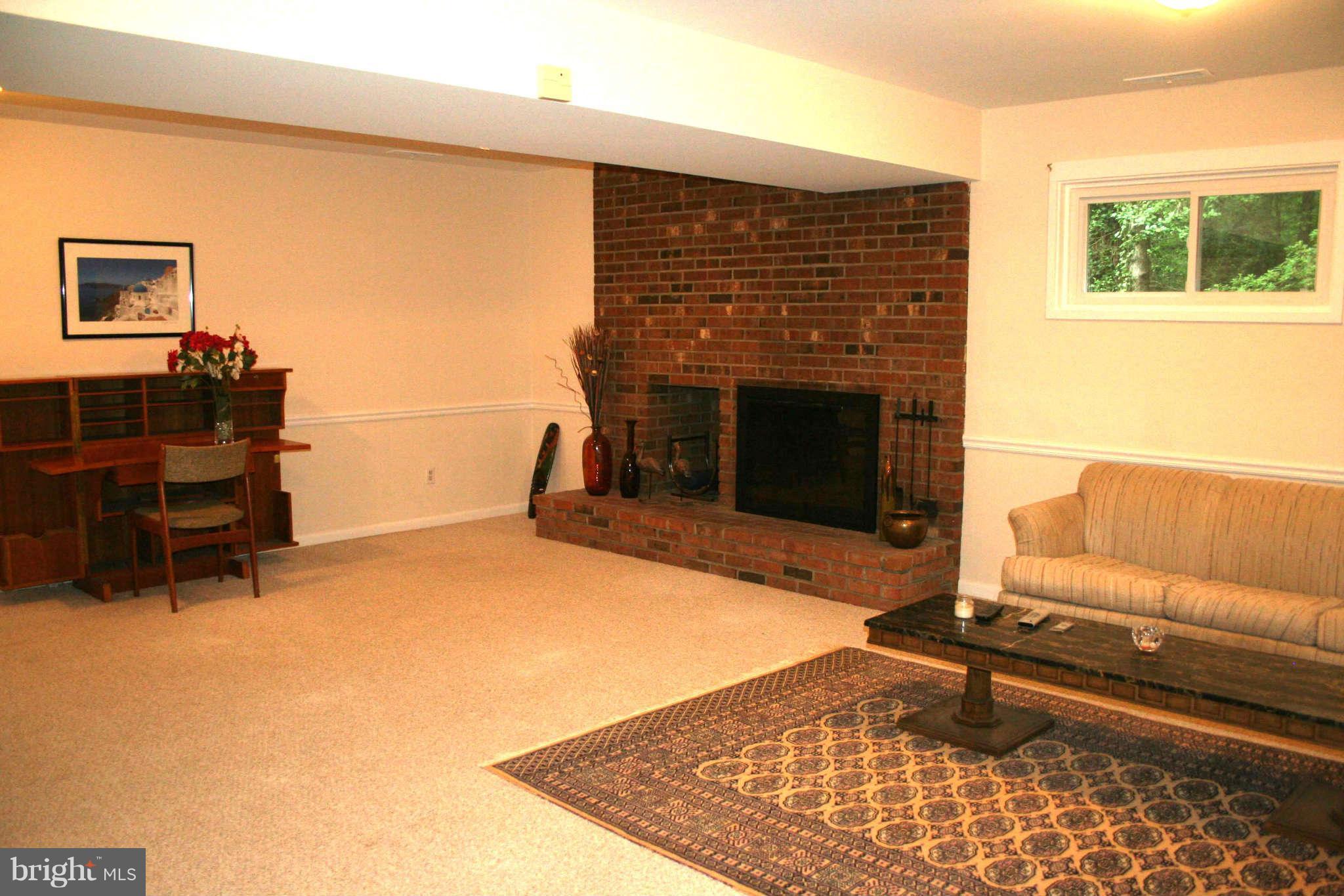 12232 Quorn Lane Reston, VA 20191 - Photo 13 of 20 Fireplace and Recessed Lights in LL