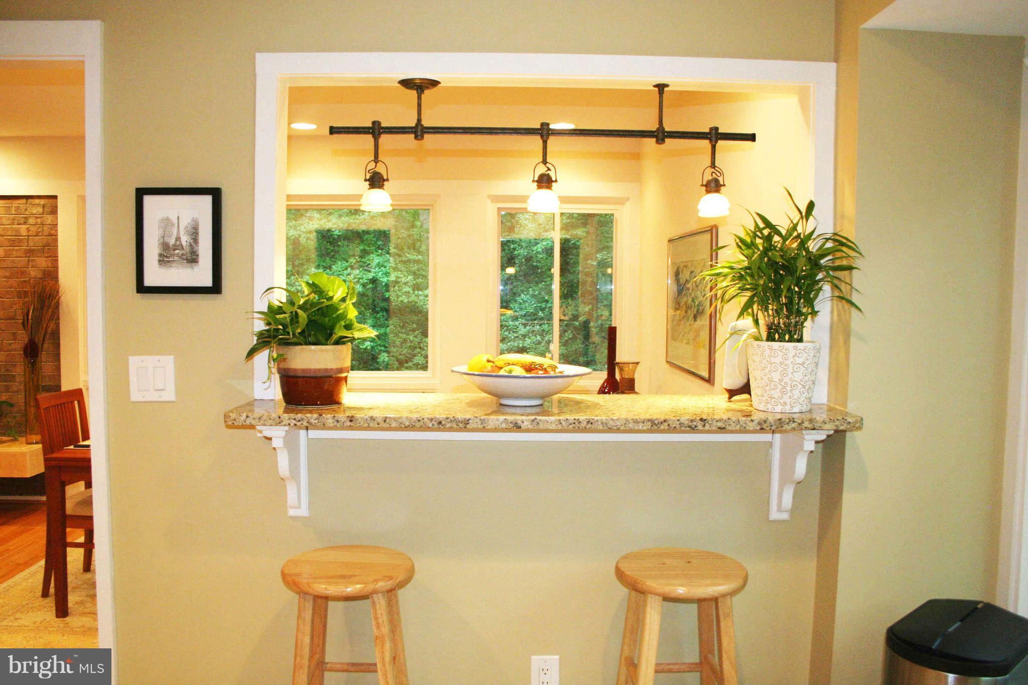12232 Quorn Lane Reston, VA 20191 - Photo 5 of 20 Breakfast bar w granite opens to DR