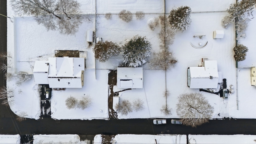 106 Baldwin Avenue Framingham, MA 01701 - Photo 10 of 13 an aerial view of residential houses with outdoor space