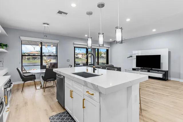 a bedroom with a bed and a chair