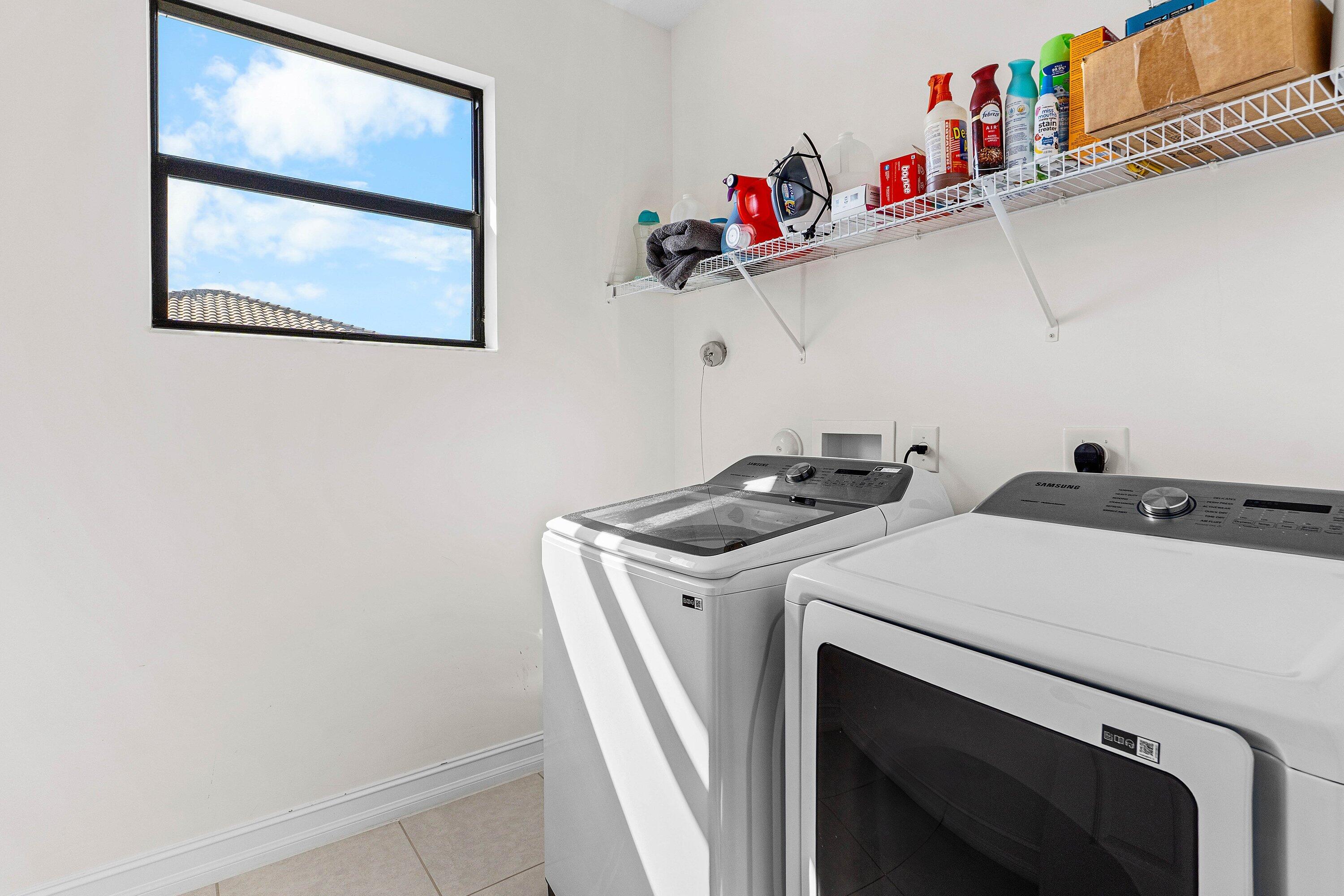 14125 Rock Salt Road Delray Beach, FL 33446 - Photo 20 of 55 a utility room with dryer and washer