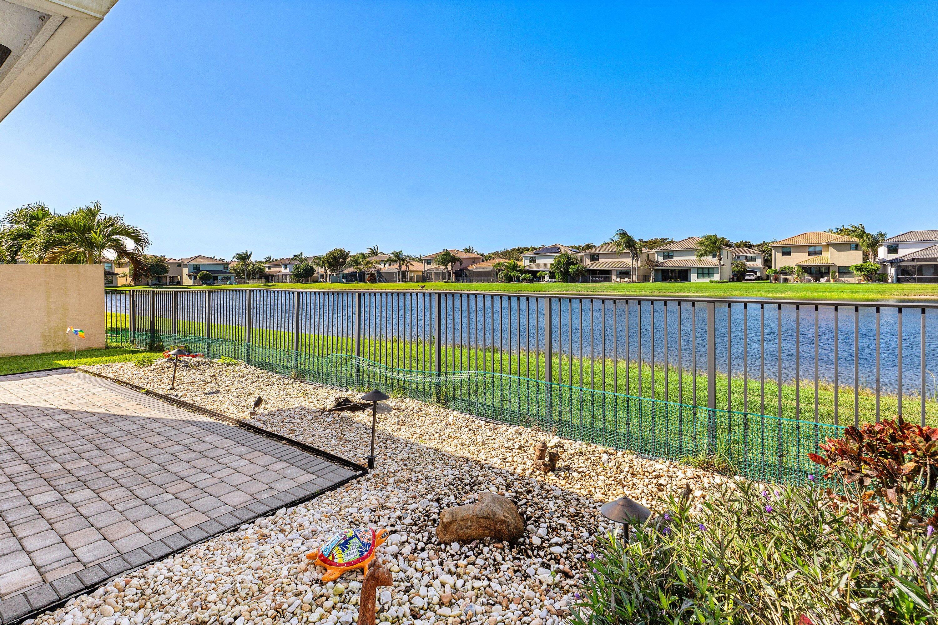 14125 Rock Salt Road Delray Beach, FL 33446 - Photo 28 of 55 a view of a garden with wooden fence