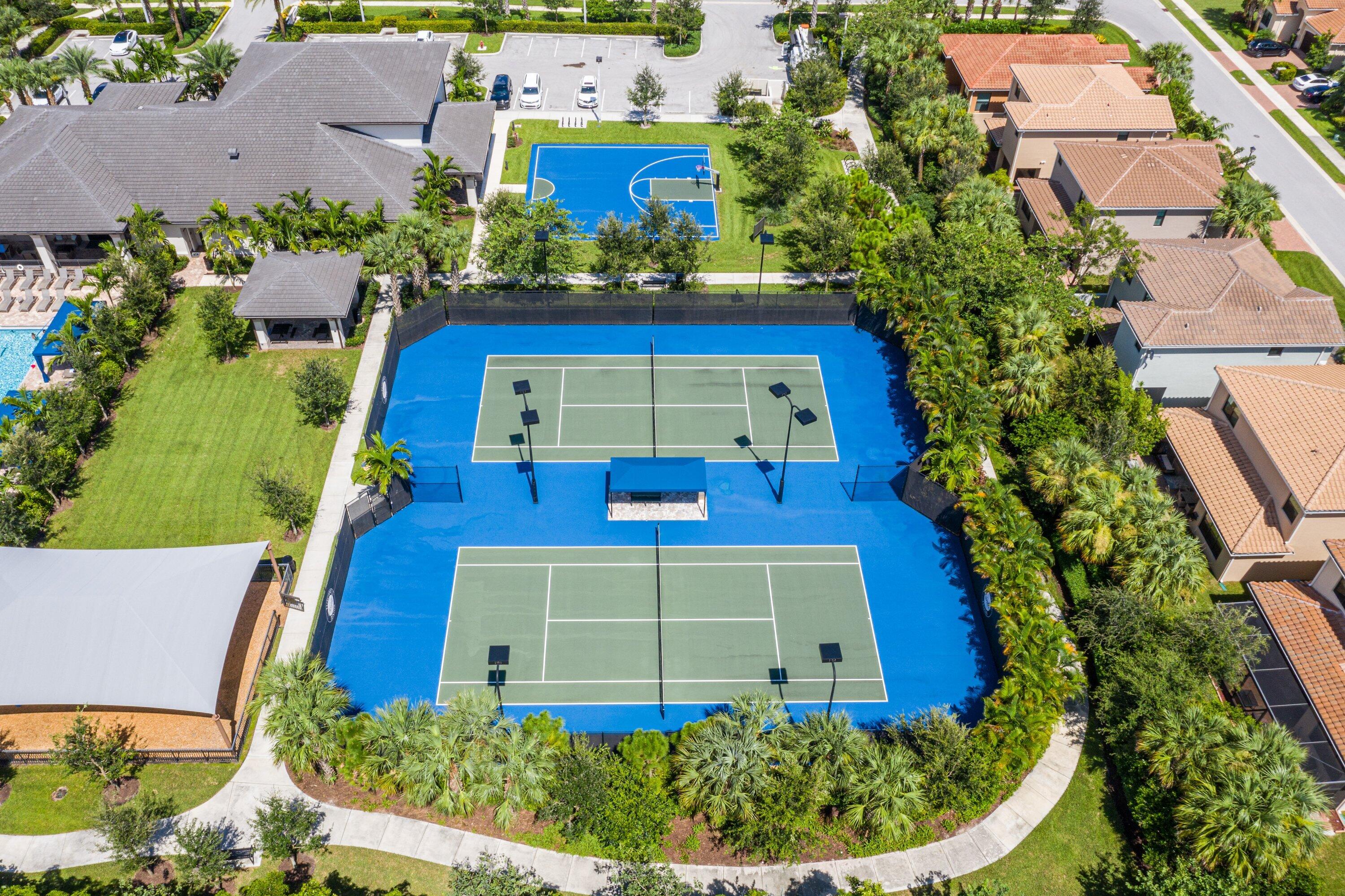 14125 Rock Salt Road Delray Beach, FL 33446 - Photo 42 of 55 an aerial view of a house with a yard and potted plants
