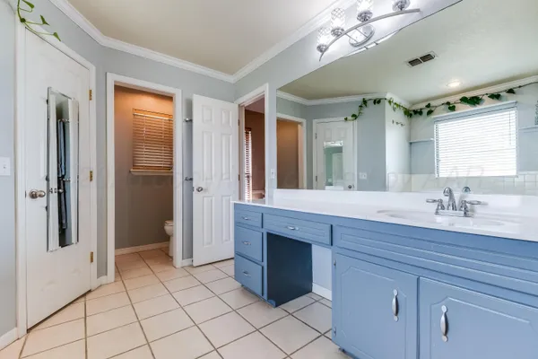 a bathroom with a bathtub and a sink