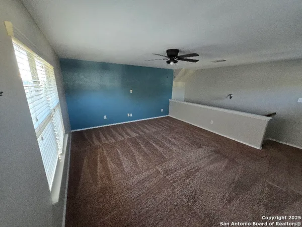 a view of a room with a staircase