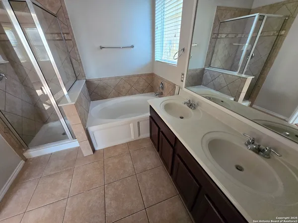 a bathroom with a sink and a bathtub