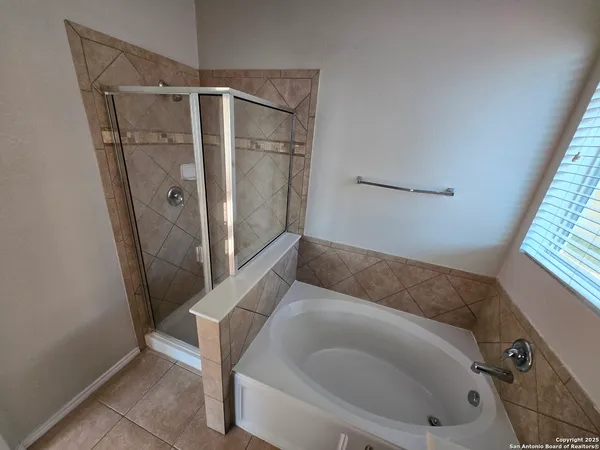 a en suite bathroom with a shower and toilet