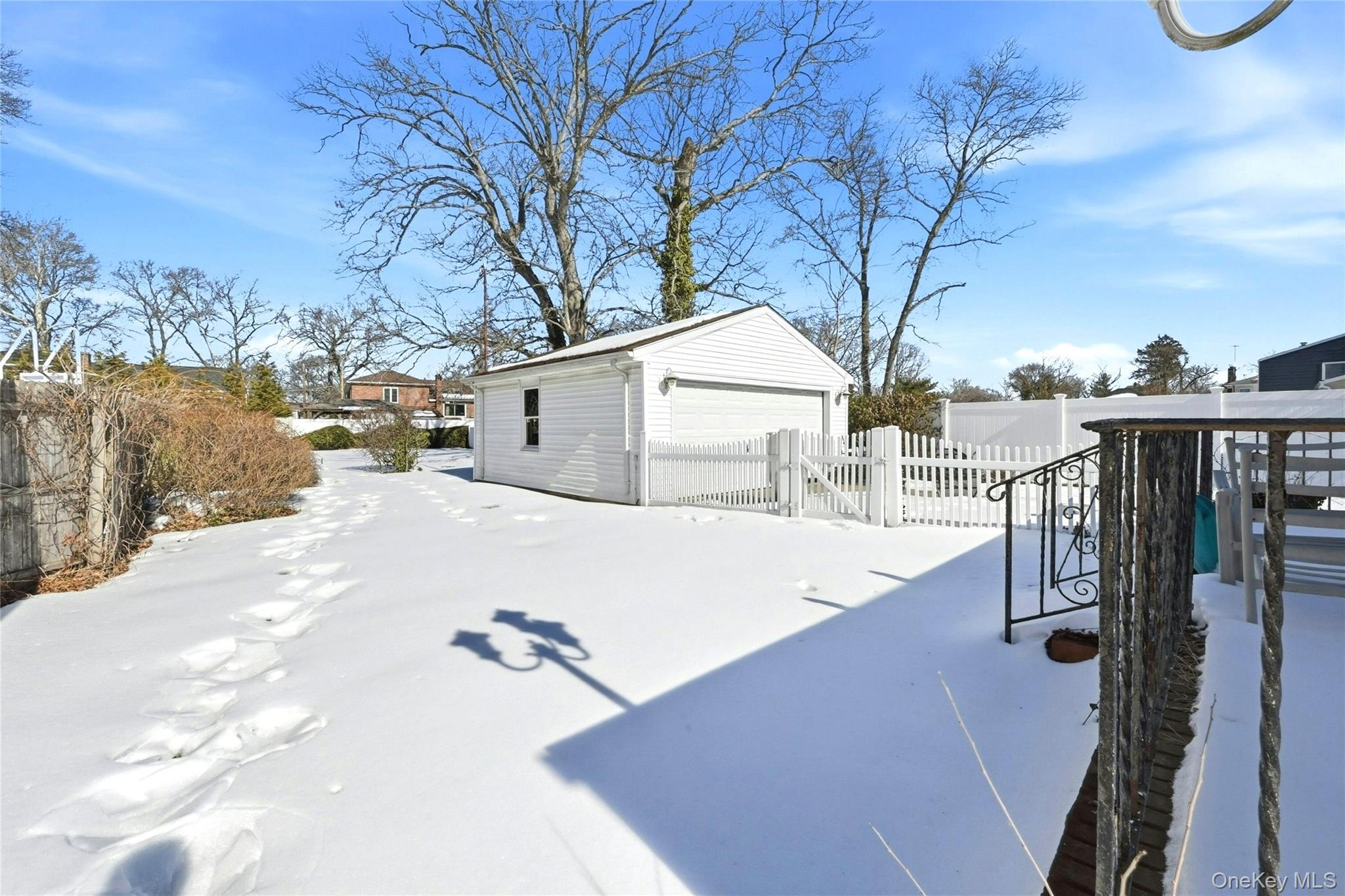 197 Foxhurst Road Oceanside, NY 11572 - Photo 27 of 28 The Expansive Backyard Offers An Oversized Two Car Detached Garage (Perfect For An Auto Enthusiast, Mechanic Or Landscaper) And Huge Separate Section Of The Backyard Behind The Garage - Perfect For An In Ground Pool.