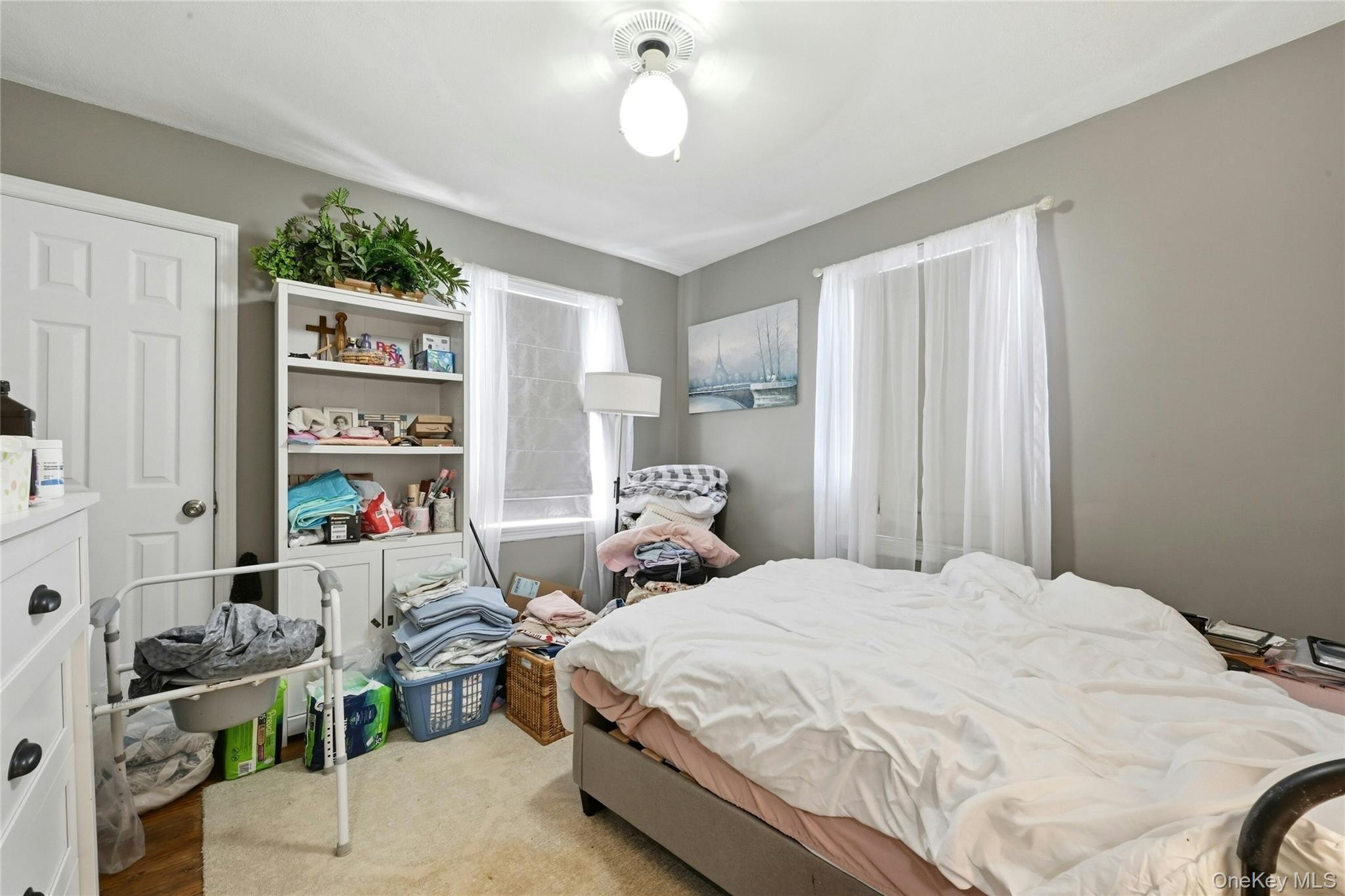 197 Foxhurst Road Oceanside, NY 11572 - Photo 10 of 28 A Well Sized First Floor Bedroom Offers Two Large Windows For Natural Light, Ceiling Fan & A Good Sized Closet.