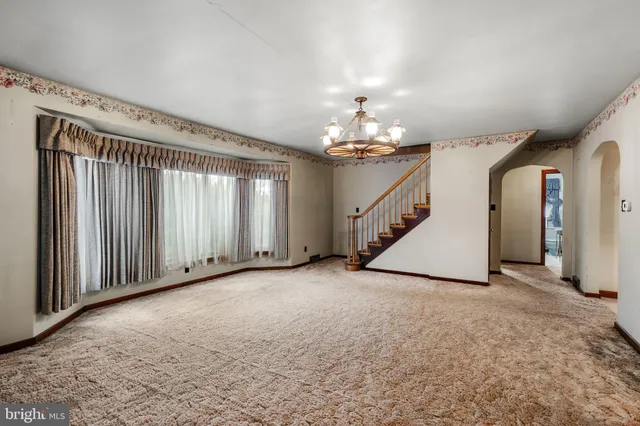 a view of a livingroom with a staircase