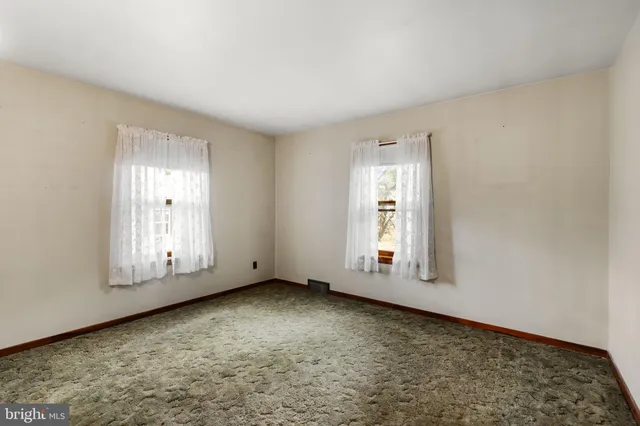 an empty room with window
