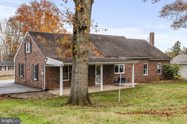 a house view with a garden space