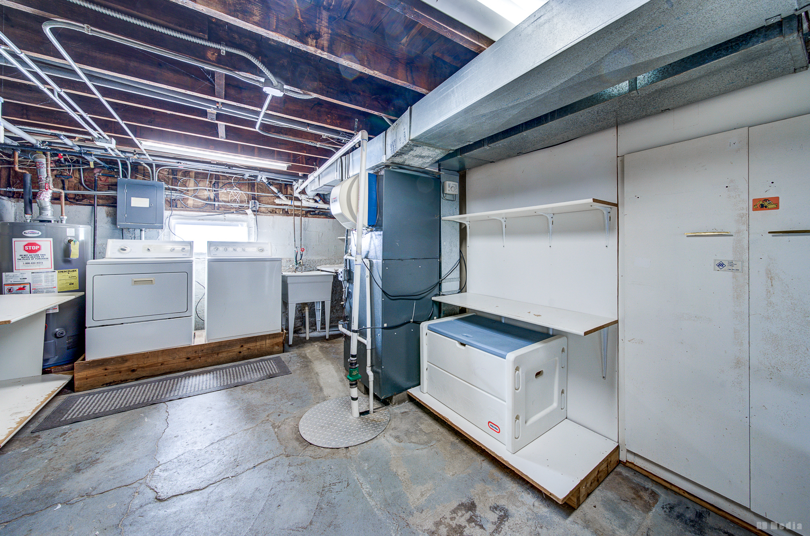 14603 Kenton Avenue Midlothian, IL 60445 - Photo 15 of 17 a storage room with cabinets