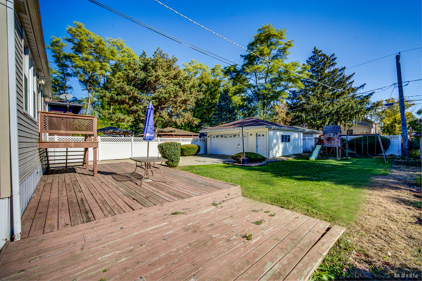14603 Kenton Avenue Midlothian, IL 60445 - Photo 16 of 17 a view of a house with backyard and sitting area