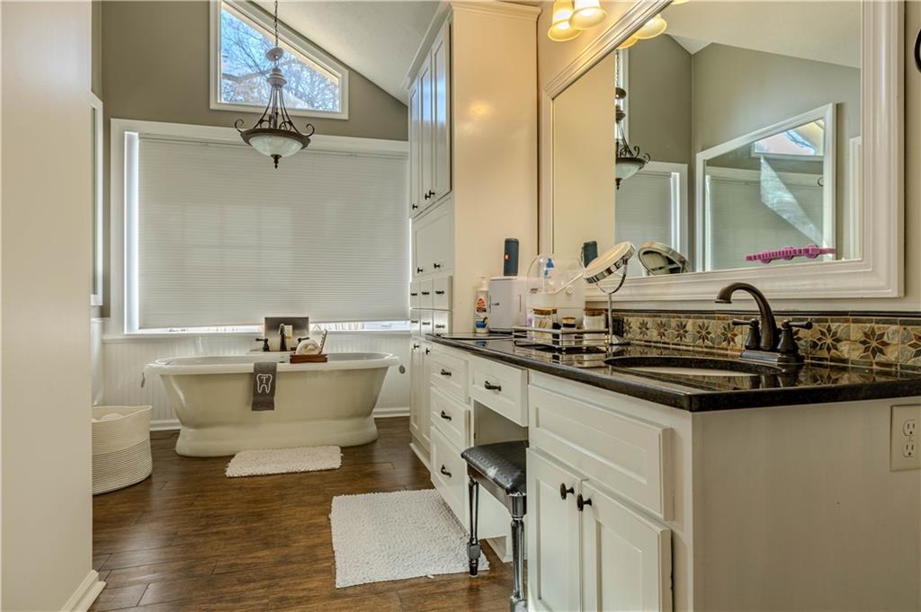 9 Ladonna Place Southwest Rome, GA 30165 - Photo 30 of 32 a bathroom with a sink and a mirror