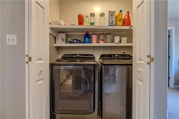 a view of a closet in a room