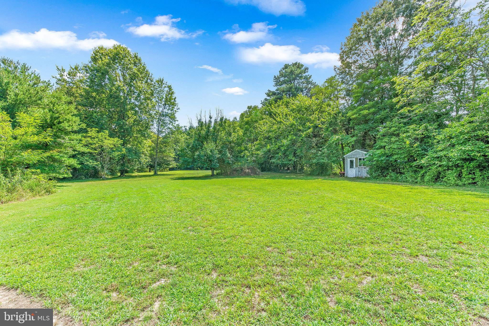 2440 Hallowing Point Road Prince Frederick, MD 20678 - Photo 33 of 51 a view of yard with swimming pool and green space