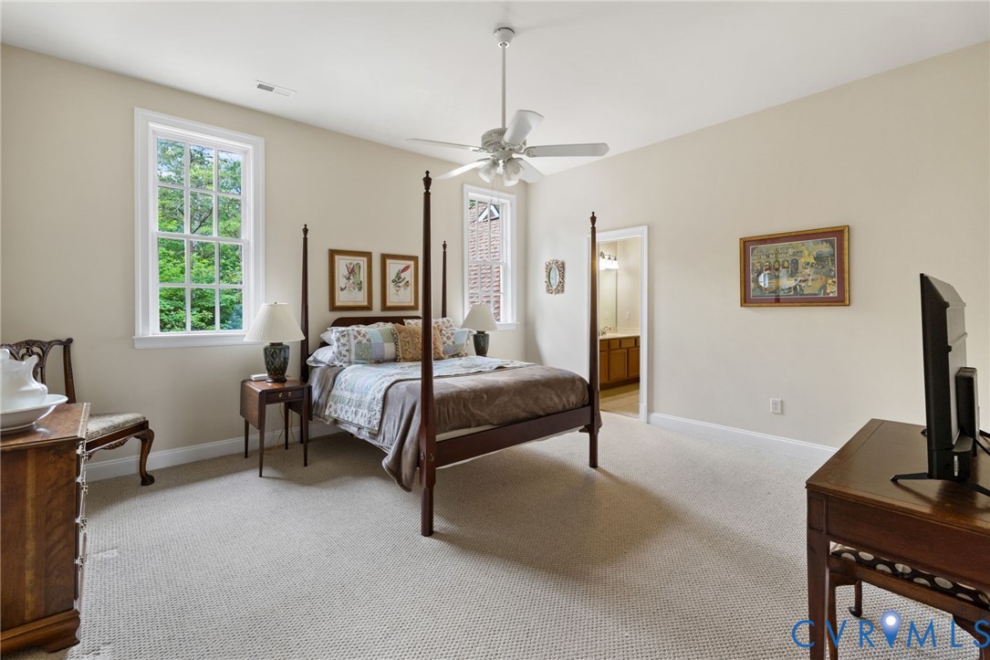 13173 Scotchtown Road Beaverdam, VA 23015 - Photo 43 of 65 a bedroom with a bed tv and a window