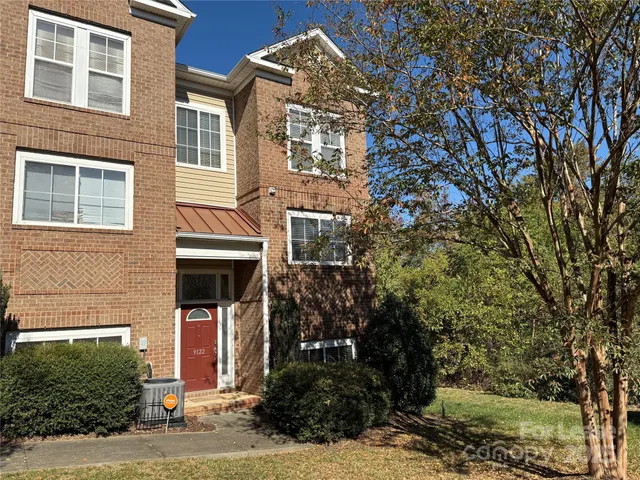a car parked in front of a house