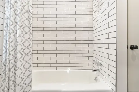 a bathroom with a bathtub