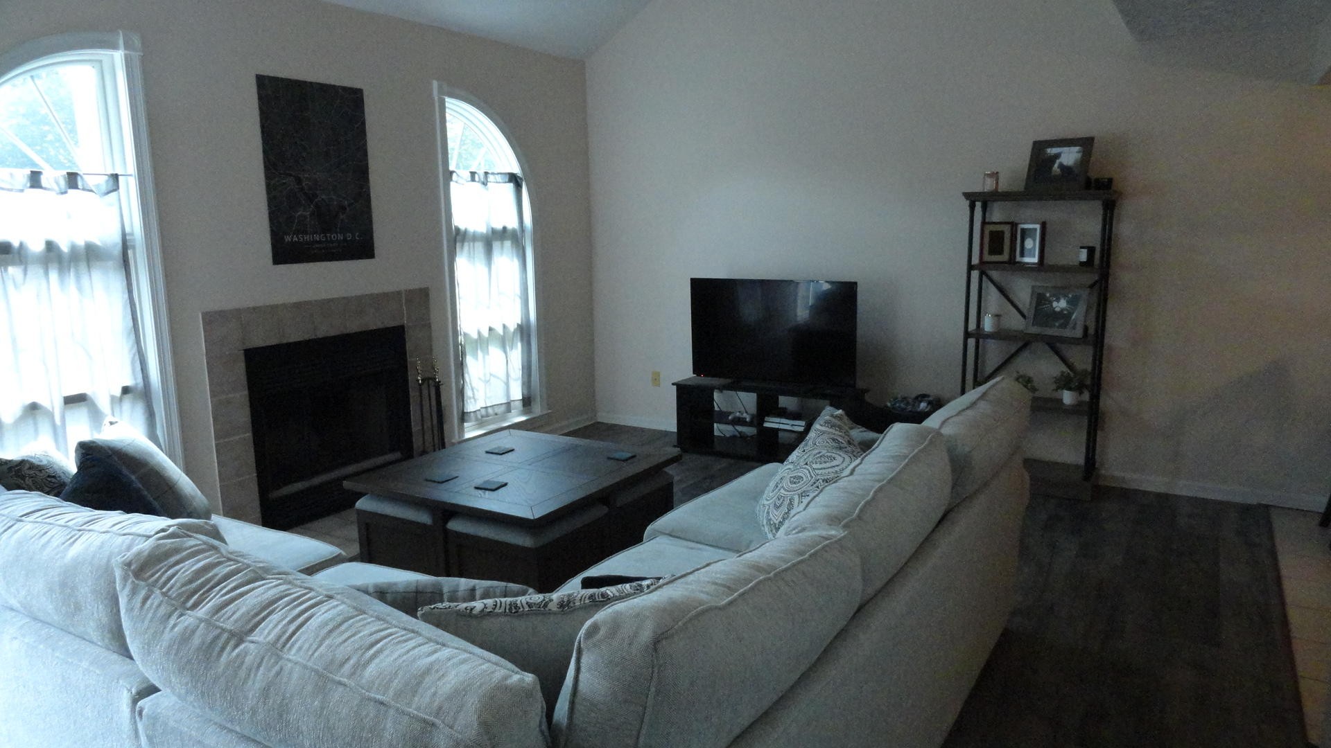 116 Hanover Place Oak Ridge, TN 37830 - Photo 7 of 17 a living room with furniture a flat screen tv and a fireplace