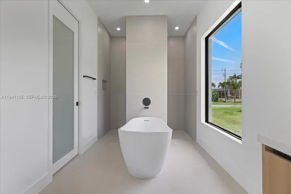 a bathroom with a bathtub