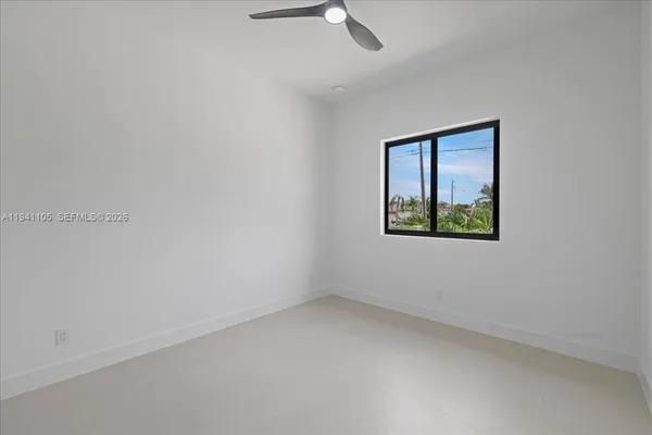 an empty room with window