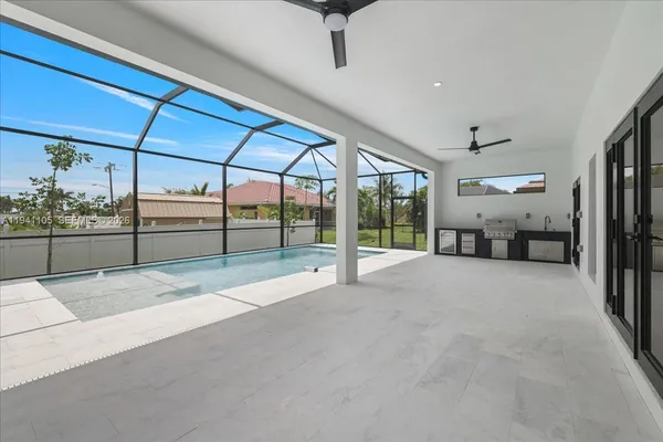 a kitchen with a stove and cabinets